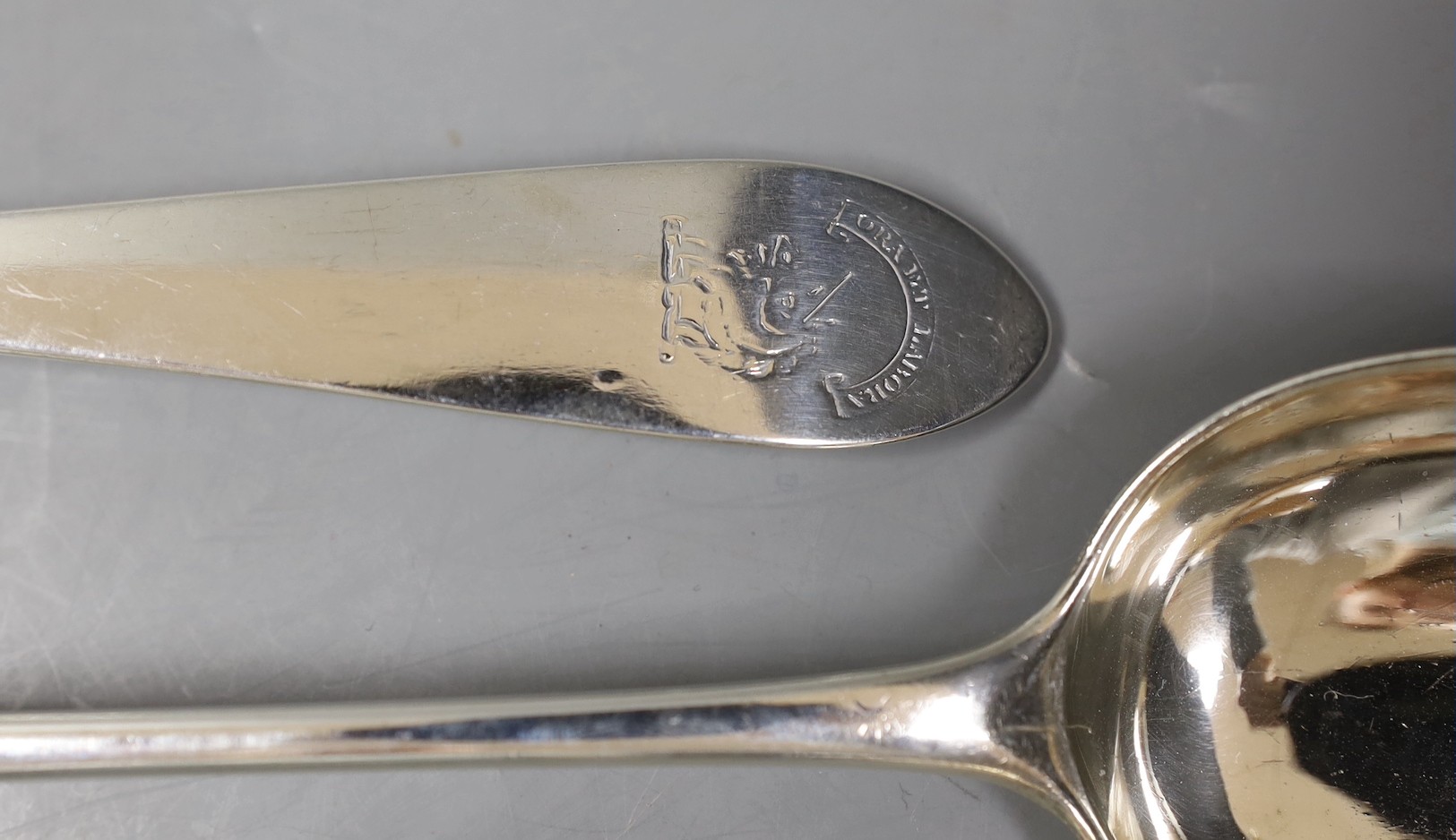 A pair of George III Scottish silver Celtic tip basting spoons, with engraved crest, Patrick Robertson, Edinburgh, 1790, 33.2cm, 7oz.